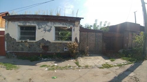 Proprietate imobiliara - teren si constructii str. Oltului - Tg Mures